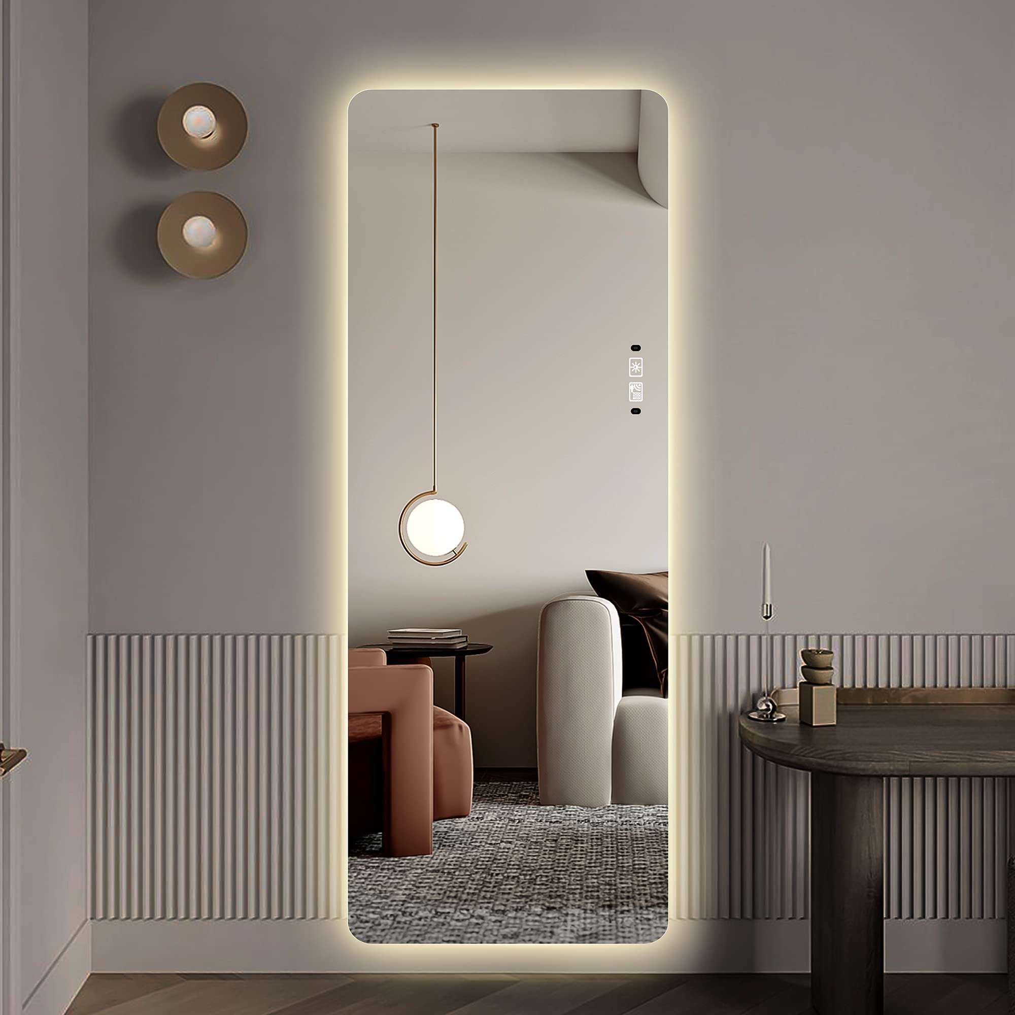 A large mirror reflecting a person's full body.