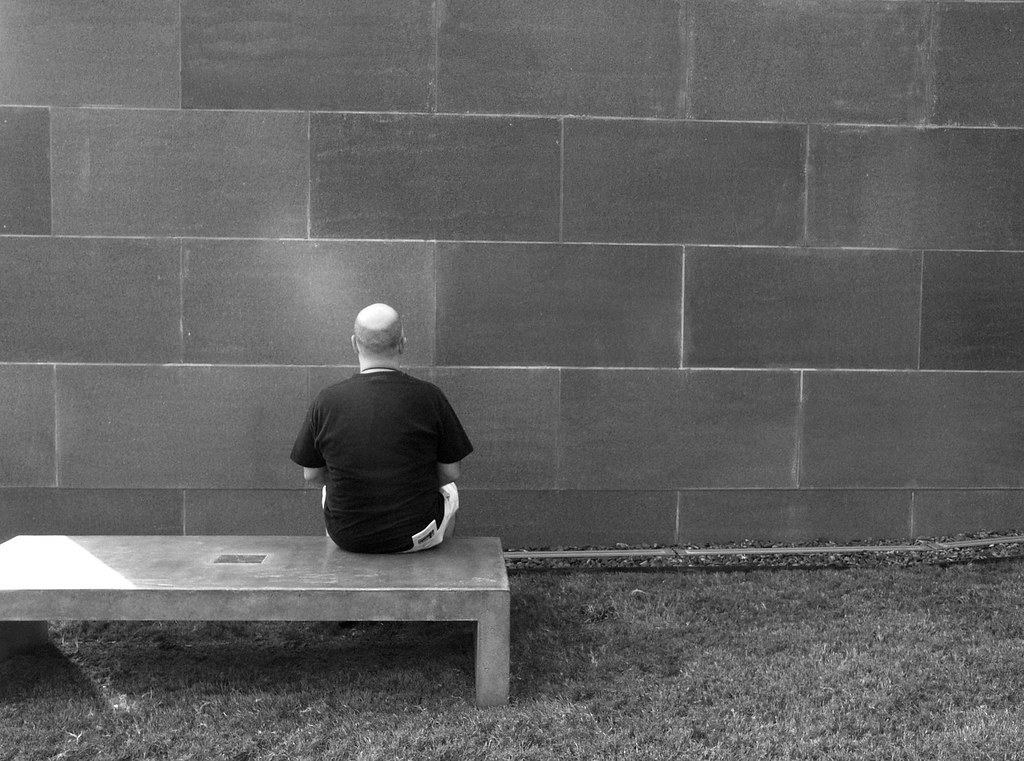 A person staring blankly at a wall