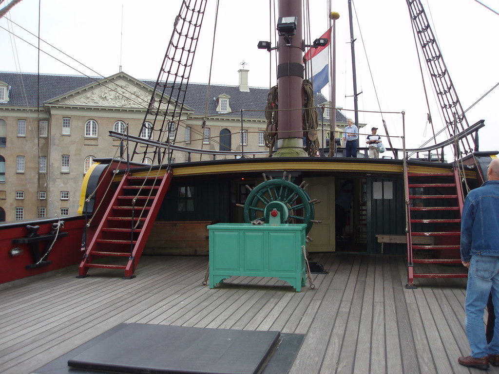 A pirate ship deck with crew members following nautical commands