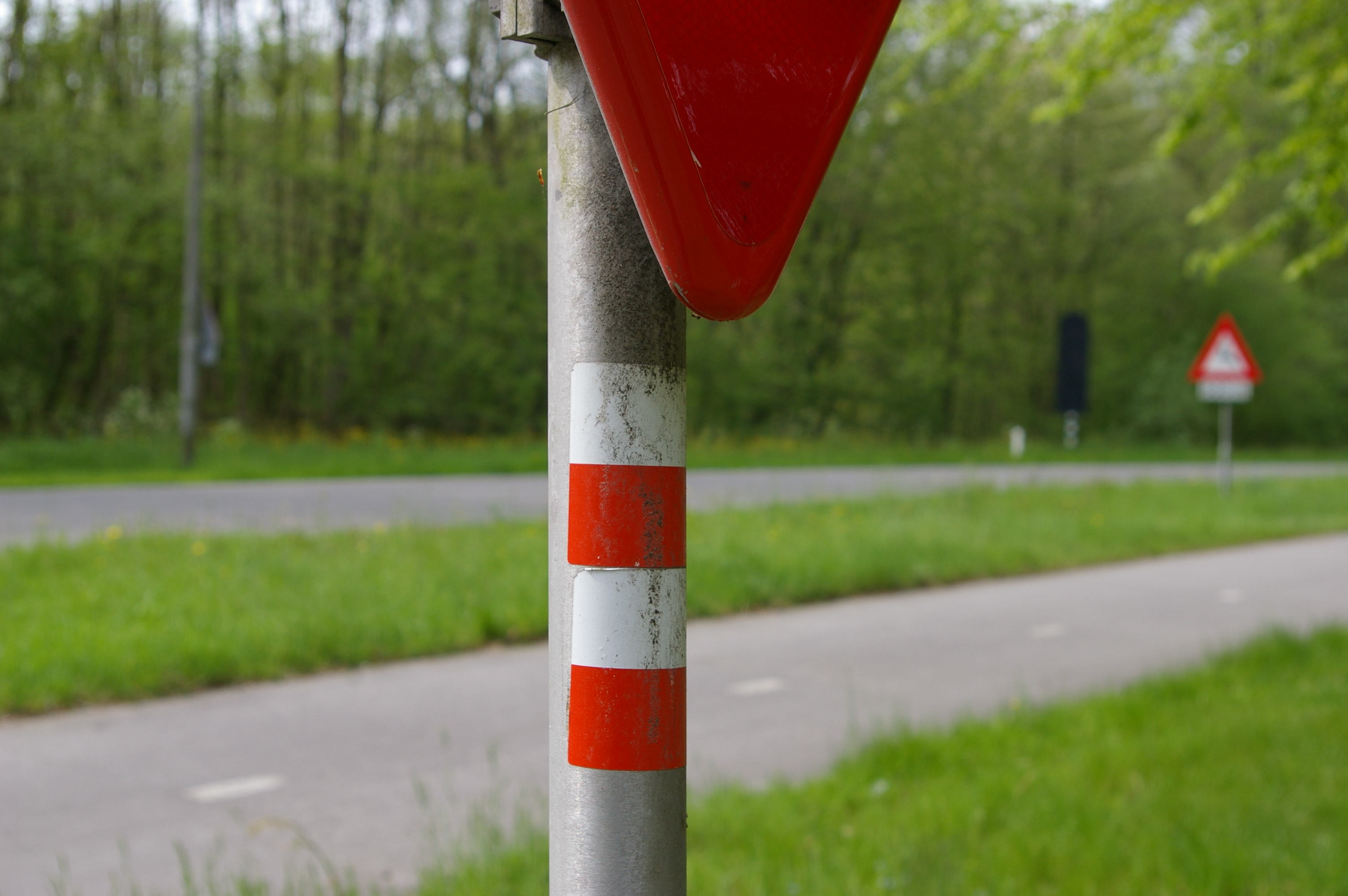 A road sign indicating a change in direction
