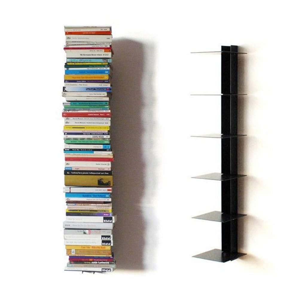 Book shelf with a variety of books