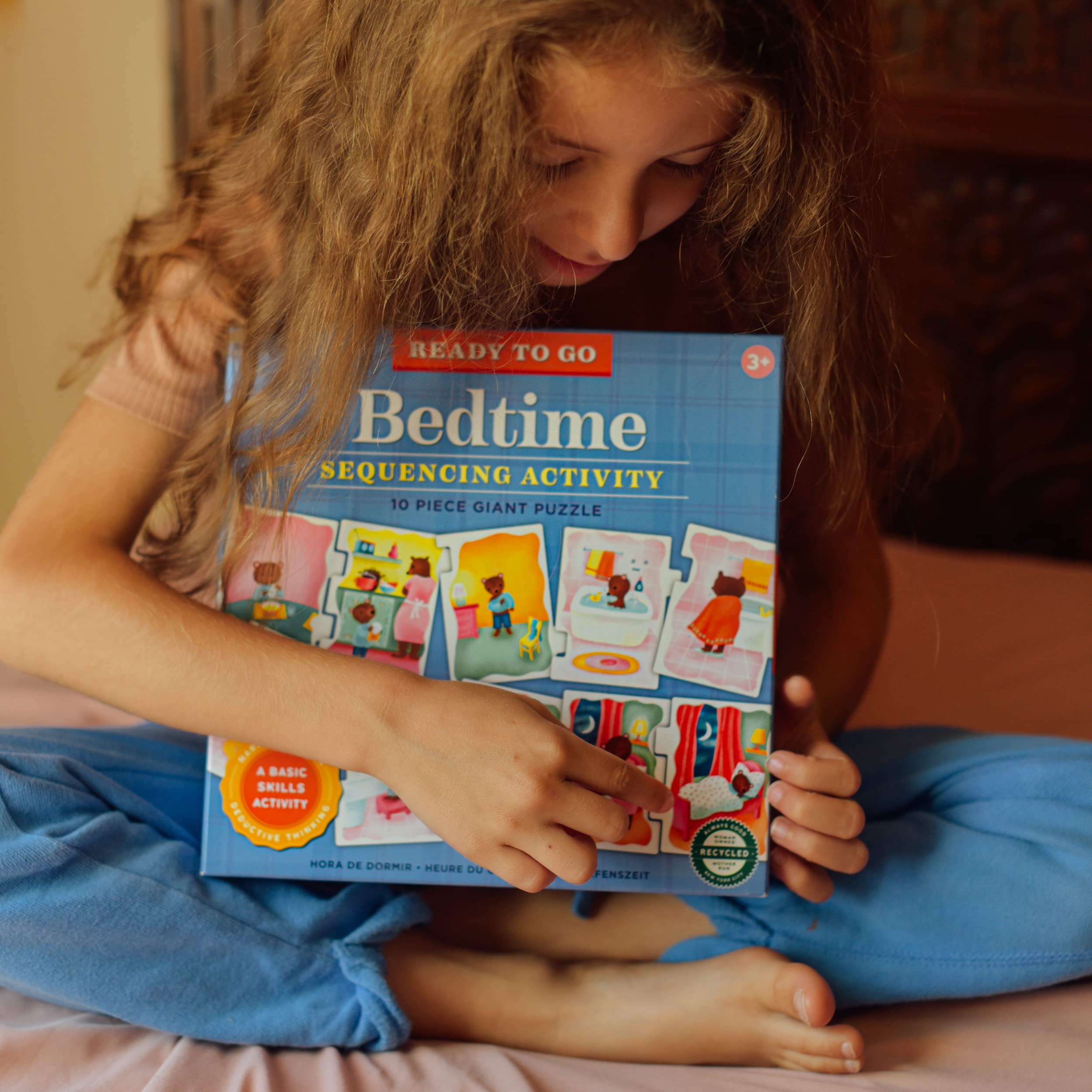 Child completing a bedtime puzzle