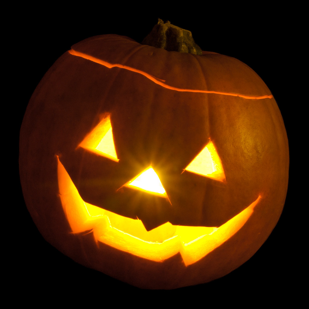 Jack-o'-lantern with Halloween song lyrics written on it
