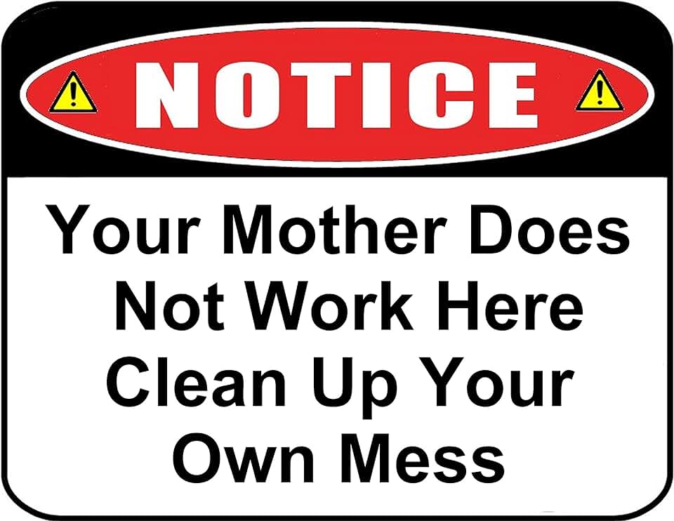 Kitchen counter with a clean up after yourself sign