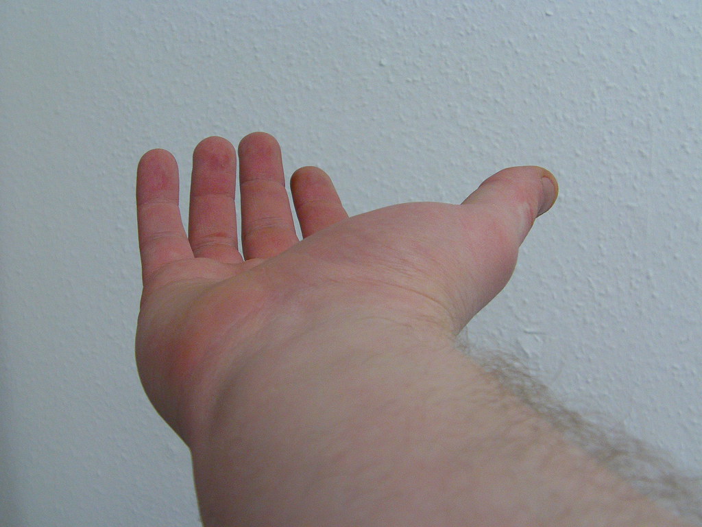Outstretched hand accepting a handshake