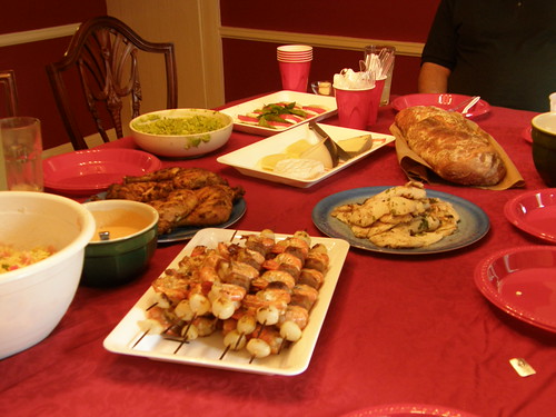 Potluck spread with various dishes