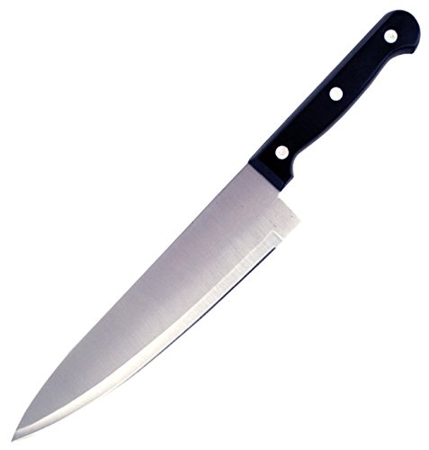 Sharp knife slicing through butter