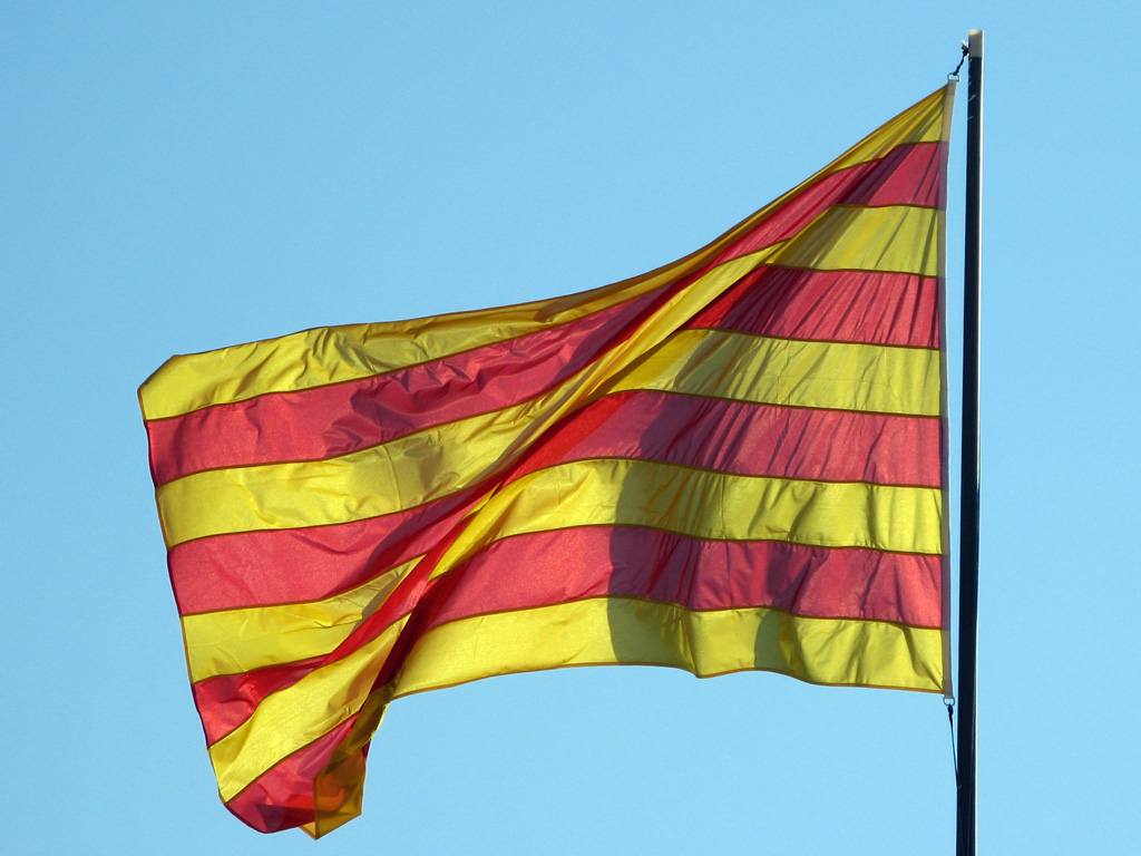 Spanish flag with the words Hasta La Vista