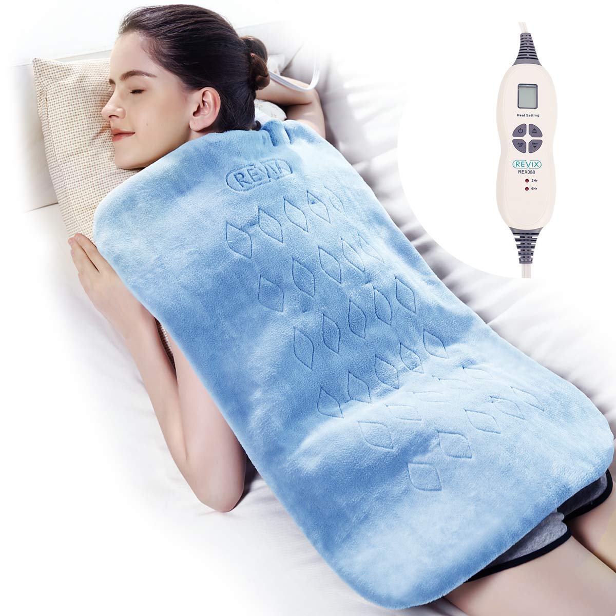 Woman holding a heating pad to her stomach